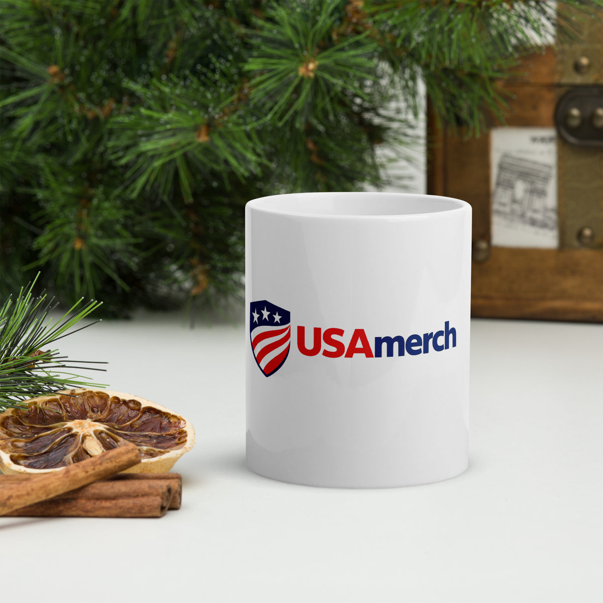 USAmerch shield logo printed on an 11 oz white glossy ceramic mug, front view