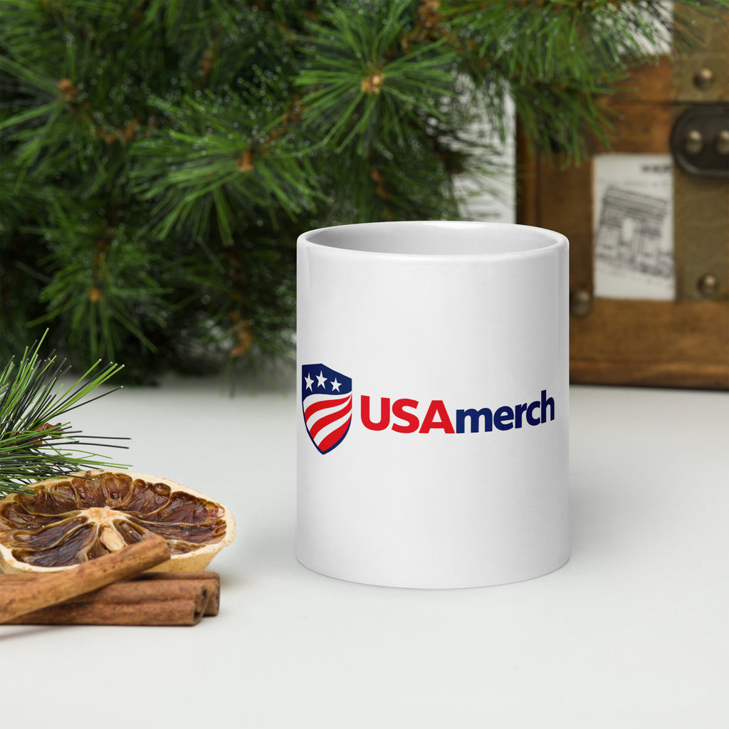 USAmerch shield logo printed on a 20 oz white glossy ceramic mug, front view